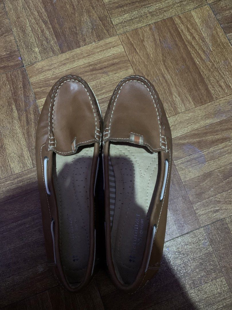 Naturalizer Brown Leather Loafers (Category: Loafers) located in Manila. Submitted by usagichan_rabbit (Listing ID 1462442952, Image 1). Description: - Brand: Naturalizer - Color: Brown - Material: Leather - Size: 8M best fit 7 to 7.5 - Features: N5 Comfort technology for all-day wear - Style: Classic penny loafer with white stitching detail - Ease of Use: Easy slip-on design - Versatility: Great for casual or work outfits.