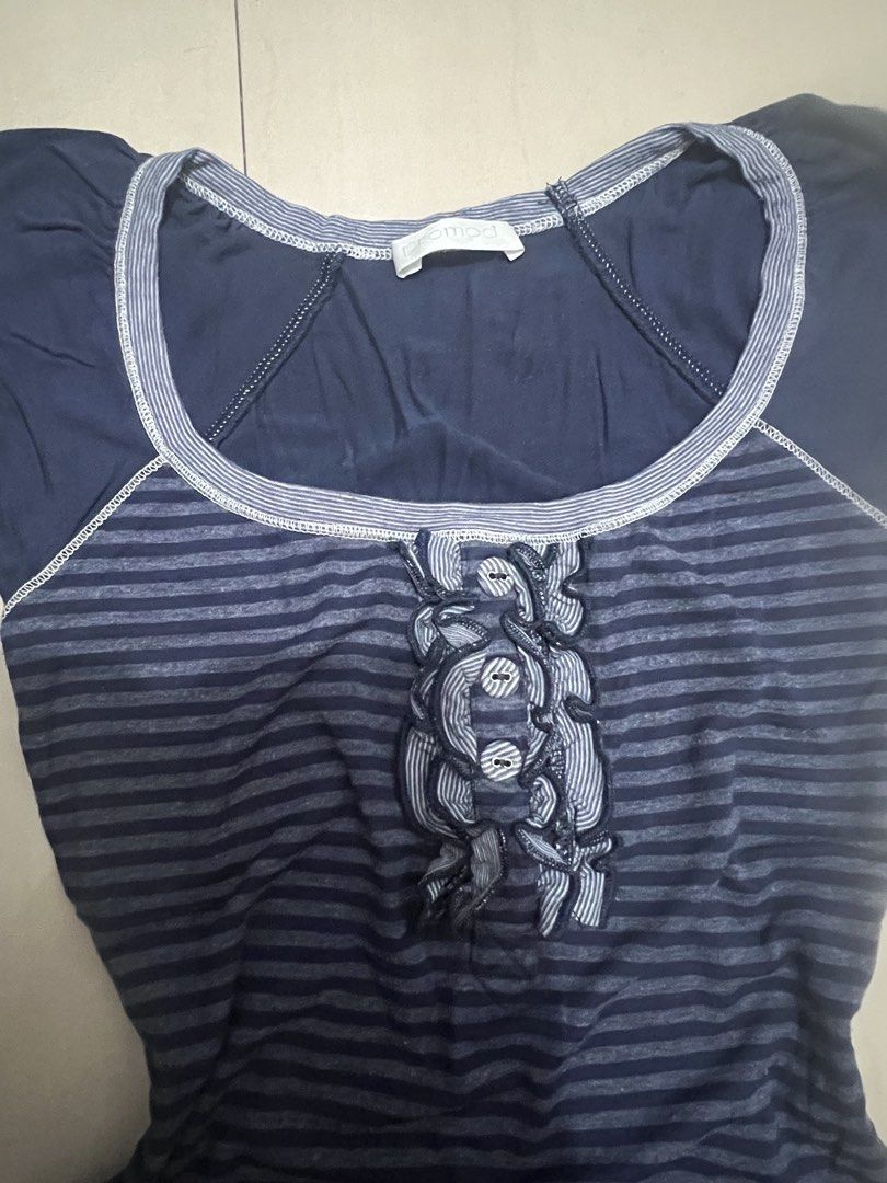 Navy Blue Striped Cap Sleeve Top (Category: Blouses) located in Caloocan City. Submitted by guaconerva97479 (Listing ID 1462617649, Image 2). Description: - Navy blue top with stripes - Adorable floral applique on the front - Cap sleeves with cute ruffled edges - Estimated size: Small to Medium .