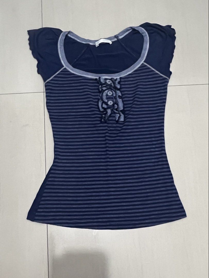 Navy Blue Striped Cap Sleeve Top (Category: Blouses) located in Caloocan City. Submitted by guaconerva97479 (Listing ID 1462617649, Image 1). Description: - Navy blue top with stripes - Adorable floral applique on the front - Cap sleeves with cute ruffled edges - Estimated size: Small to Medium .