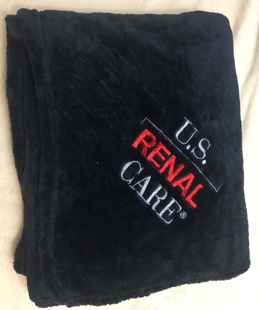 Navy Blue Throw Fleece Blanket (Category: Bedding & Towels) located in Imus. Submitted by stop_shop7 (Listing ID 1462572289, Image 2). Description: - Soft navy blue fleece blanket - Features embroidered U.S. Renal Care logo - Ideal for staying warm and cozy - Perfect for home or travel - Easy to care for.