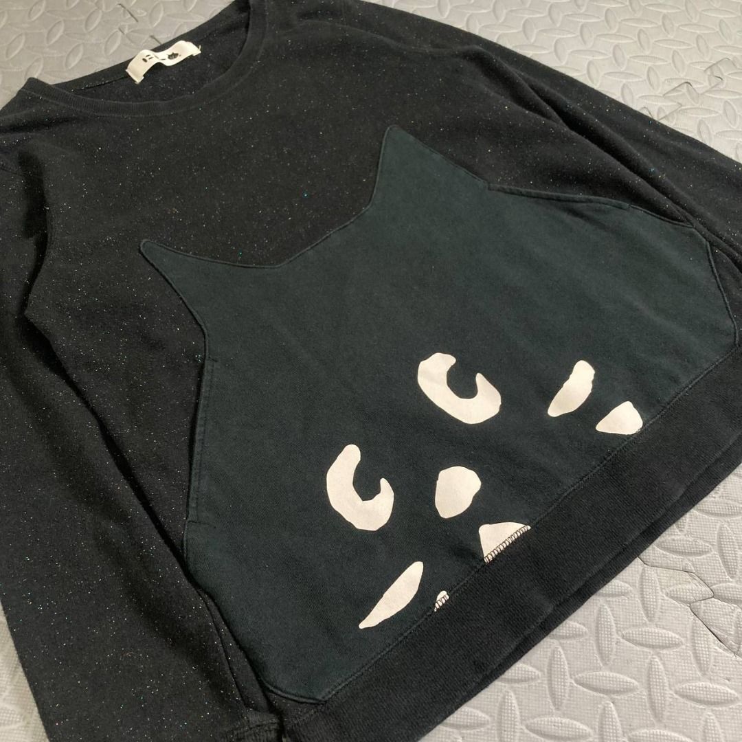 Ne-net – Nyaa Cat Patch Logo Glittered Sweatshirt (Category: Longsleeves) located in Quezon City. Submitted by archived.g (Listing ID 1462481734, Image 3). Description: Ne-net – Nyaa Cat Patch Logo Glittered Sweatshirt - Brand: Ne-net Made in: China Year: Material: Cotton Color: Black Marked size: 2 Sizing: Measurements (laid flat): Shoulders: 15" Sleeves: 21.5” Bust: 18.5” Waist: 18.5" Length: 23.5” Color rating: 9/10 Condition: 9/10 Flaws: mini