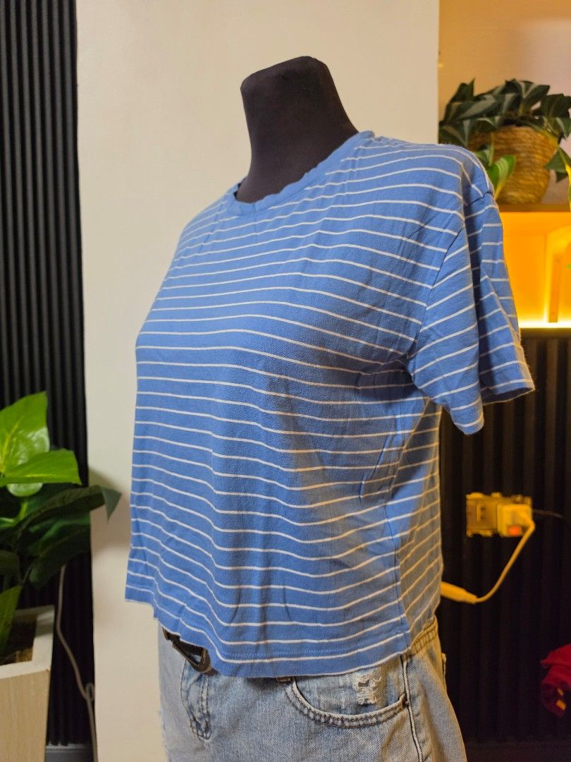 New Look Blue & White Striped T-shirt medium (Category: Shirts) located in Paranaque City. Submitted by franinnashop (Listing ID 1462608749, Image 2). Description: - Brand: New Look - Color: Blue with white stripes - Sleeves: Short - Neckline: Crew neck - Size: Medium (M) - Condition: Good, with a minor mark on the front (visible in 3rd photo) declutter medium paranaque city.