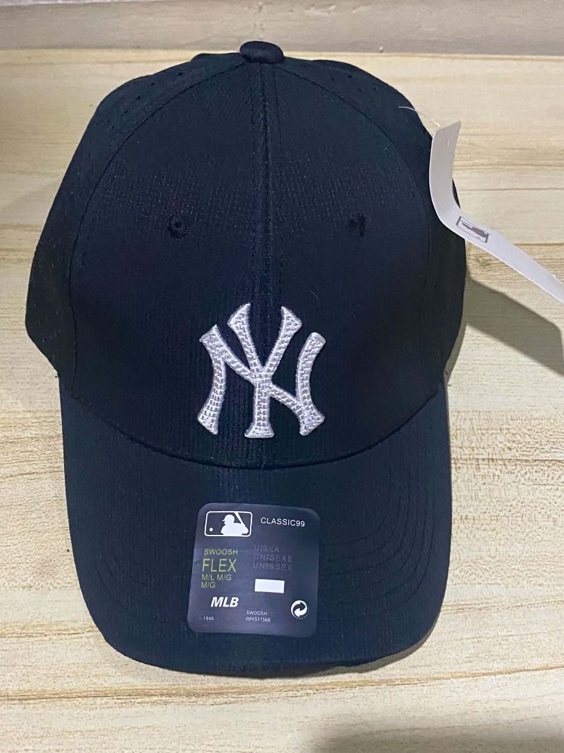 New York Yankees MLB Baseball Cap - Black, Perforated/Ventilated. (Category: Caps & Hats) located in Quezon City. Submitted by carlos132 (Listing ID 1462649169, Image 1). Description: - Officially licensed MLB - New York Yankees - Black perforated fabric for breathability - laser cut vent holes throughout. - Embroidered "NY" logo on front - Adjustable closure (Swoosh Flex) M/L. - Brand new with tags.