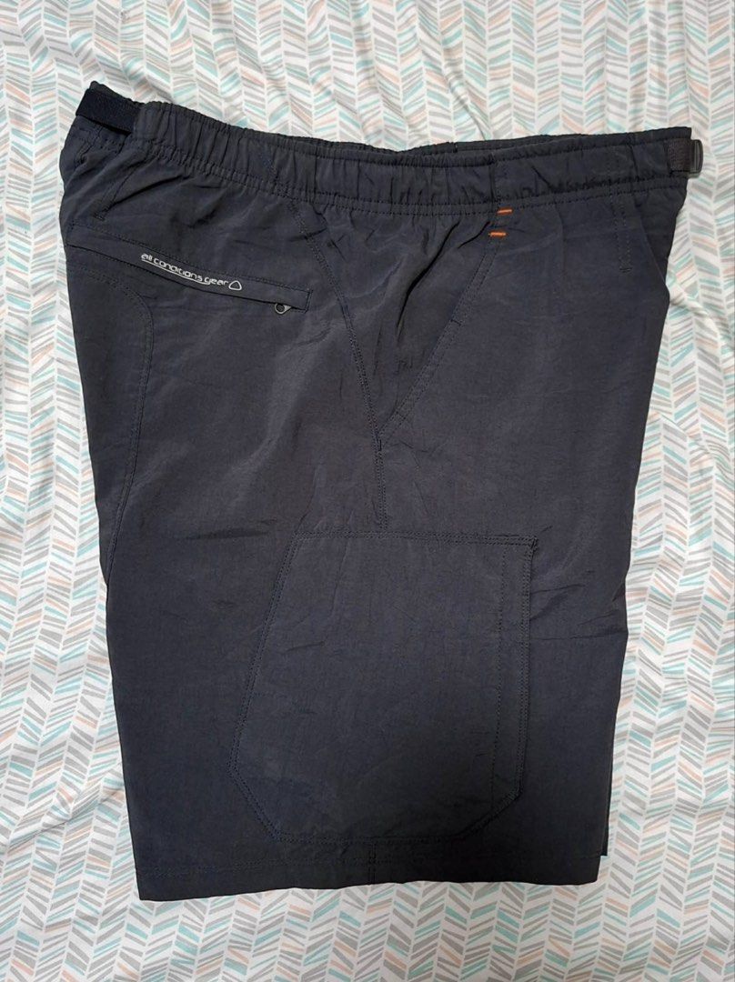 Nike ACG Shorts Black Polyester Size S (Category: Shorts) located in Lapu Lapu. Submitted by vanzfinds_16 (Listing ID 1462615966, Image 3). Description: - Brand: Nike ACG - Color: Black - Material: 100% Polyester - Waistband: Elastic with buckle belt - Pockets: Side cargo pockets, back zip pocket - Size: S - Ideal for: Outdoor activities, casual wear.