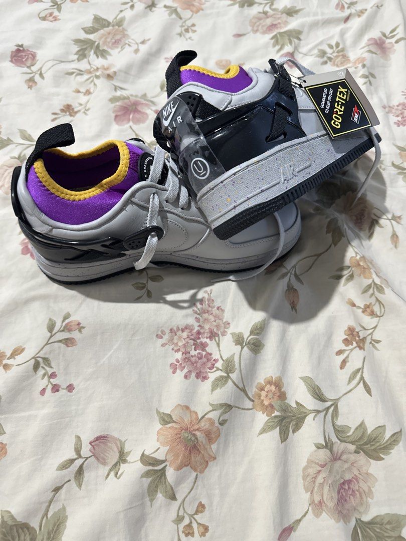 Nike Undercover Air Force 1 GORE-TEX “CHAOS” (Category: Sneakers) located in Taguig. Submitted by mywardrobe001 (Listing ID 1462560362, Image 2). Description: - Nike Air Force 1 GORE-TEX "Chaos" - Color: grey fog leather with purple and yellow accents Unisex men size us 6 // women size us7.