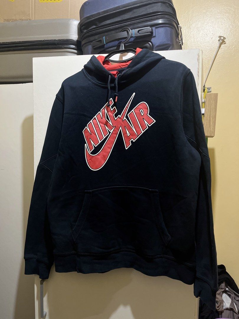 Nike Air Hoodie Black Red (Category: Hoodies) located in Manila. Submitted by jezrathrift (Listing ID 1462672784, Image 1). Description: - Black Nike Air hoodie - Red accents - Classic Nike Air logo on front - Kangaroo pocket - Drawstring hood - Size: EG - Made in China.