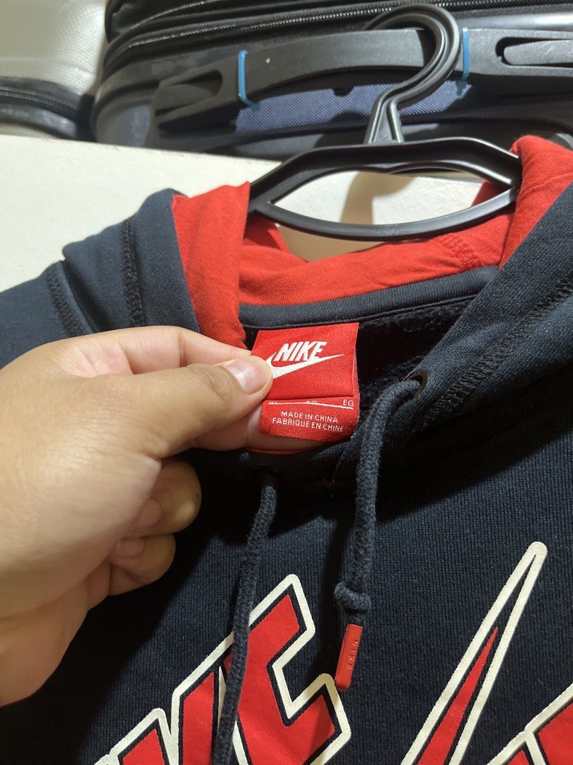 Nike Air Hoodie Black Red (Category: Hoodies) located in Manila. Submitted by jezrathrift (Listing ID 1462672784, Image 3). Description: - Black Nike Air hoodie - Red accents - Classic Nike Air logo on front - Kangaroo pocket - Drawstring hood - Size: EG - Made in China.