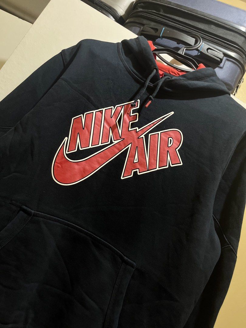 Nike Air Hoodie Black Red (Category: Hoodies) located in Manila. Submitted by jezrathrift (Listing ID 1462672784, Image 2). Description: - Black Nike Air hoodie - Red accents - Classic Nike Air logo on front - Kangaroo pocket - Drawstring hood - Size: EG - Made in China.
