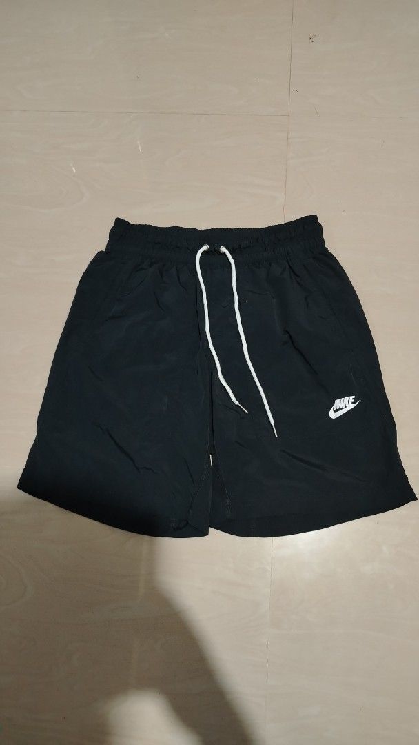 Nike Black Athletic Shorts (Category: Shorts) located in Tagum. Submitted by kotasallys40096 (Listing ID 1462584656, Image 2). Description: - Black Nike shorts - Elastic waistband with drawstring - Two side pockets - Ideal for sports or casual wear - Made in Vietnam - Size S Dimension 📍 Waist 28-34 Length 17 Hem 11.