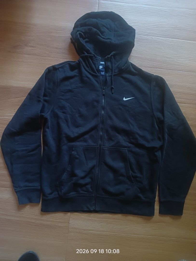 Nike Black Full Zip Hoodie Jacket (Category: Coats, Jackets and Outerwear) located in Calamba. Submitted by manueld16204 (Listing ID 1462456356, Image 2). Description: - Black Nike Full Zip Hoodie - Size XL - Full zip front with pockets - Made in Pakistan - Material: 80% Cotton, 20% Polyester - Ideal for casual wear or workouts.