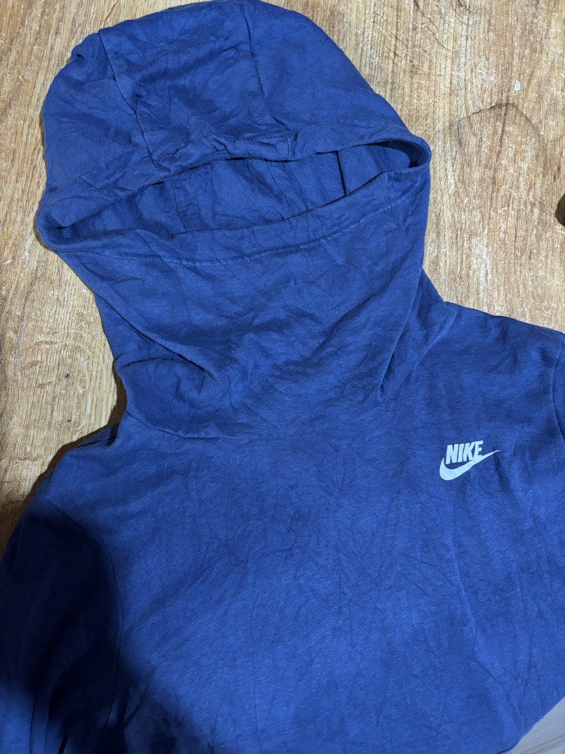 Nike Blue Hoodie Pullover Sweatshirt (Category: Coats, Jackets and Outerwear) located in Manila. Submitted by danirivera21 (Listing ID 1462442372, Image 3). Description: - Blue Nike Hoodie - Size: Medium (M) - Features classic Nike logo on chest - Front kangaroo pocket - Comfortable and casual, perfect for everyday wear - Made in Pakistan.
