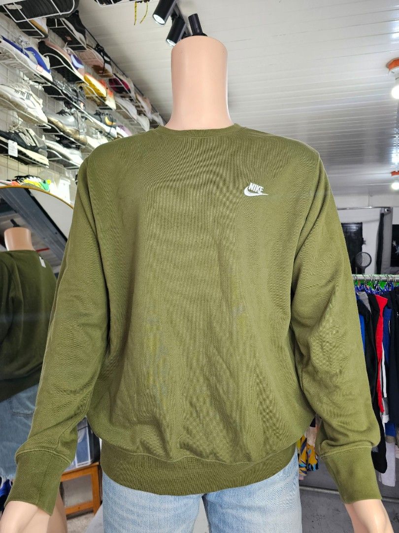 Nike crewneck sweatshirt (Category: Coats, Jackets and Outerwear) located in Baguio. Submitted by kayeonlineshop (Listing ID 1462460775, Image 2). Description: -Olive green Nike crewneck sweatshirt with a small white embroidered Swoosh logo on the left chest -Measurements included in the photos.