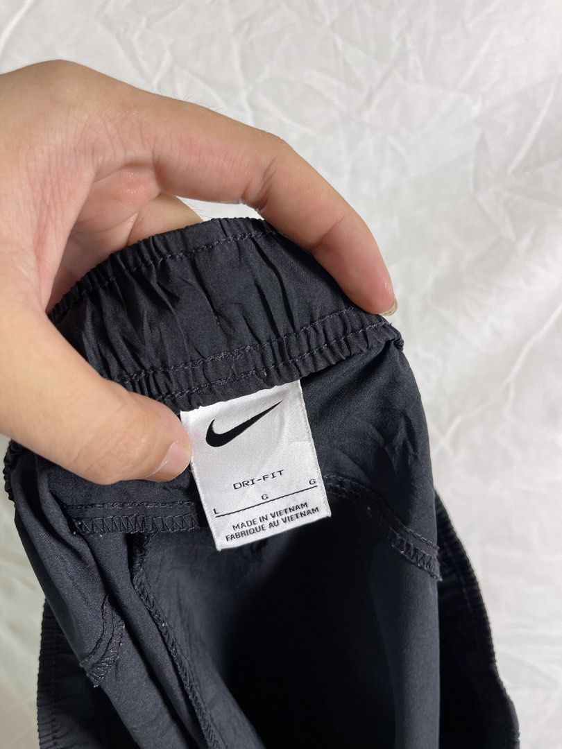 Nike Dri-Fit Black Shorts Size L (Category: Shorts) located in Manila. Submitted by noahcastilljos363 (Listing ID 1462501236, Image 2). Description: - Black Nike Dri-Fit Shorts - Size: Large (L) - Material: 100% Polyester - Made in Vietnam - Features elastic waistband - Large white Nike swoosh logo on the side - Ideal for sports and casual wear.