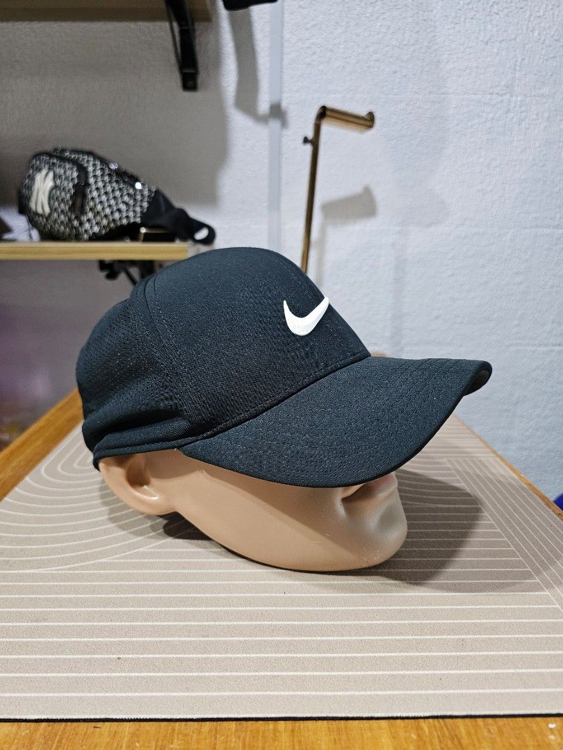 Nike Dri-FIT Club Structured Swoosh Cap (Category: Caps & Hats) located in Baguio. Submitted by kayeonlineshop (Listing ID 1462507725, Image 1). Description: -black Nike Dri-FIT Club Structured Swoosh Cap featuring a textured fabric and a prominent white embroidered Swoosh logo on the front..