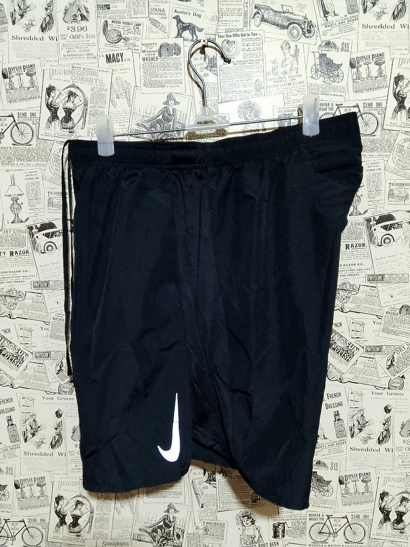 Nike Dri-FIT Running Shorts Black (Category: Activewear) located in Manila. Submitted by magnomicha06972 (Listing ID 1462609715, Image 1). Description: - Nike Dri-FIT Running Shorts - Size: L - Material: 100% Recycled Polyester (body), 100% Polyester (side panels/tight) - Made in Vietnam - Features Dri-FIT technology for moisture-wicking - Recommended Waist: 85cm - Recommended Height: 170-180cm - Ideal for workouts and casual wear.
