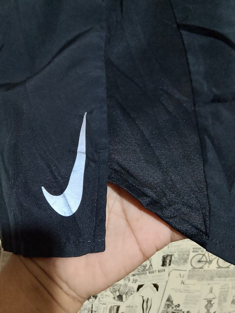 Nike Dri-FIT Running Shorts Black (Category: Activewear) located in Manila. Submitted by magnomicha06972 (Listing ID 1462609715, Image 2). Description: - Nike Dri-FIT Running Shorts - Size: L - Material: 100% Recycled Polyester (body), 100% Polyester (side panels/tight) - Made in Vietnam - Features Dri-FIT technology for moisture-wicking - Recommended Waist: 85cm - Recommended Height: 170-180cm - Ideal for workouts and casual wear.