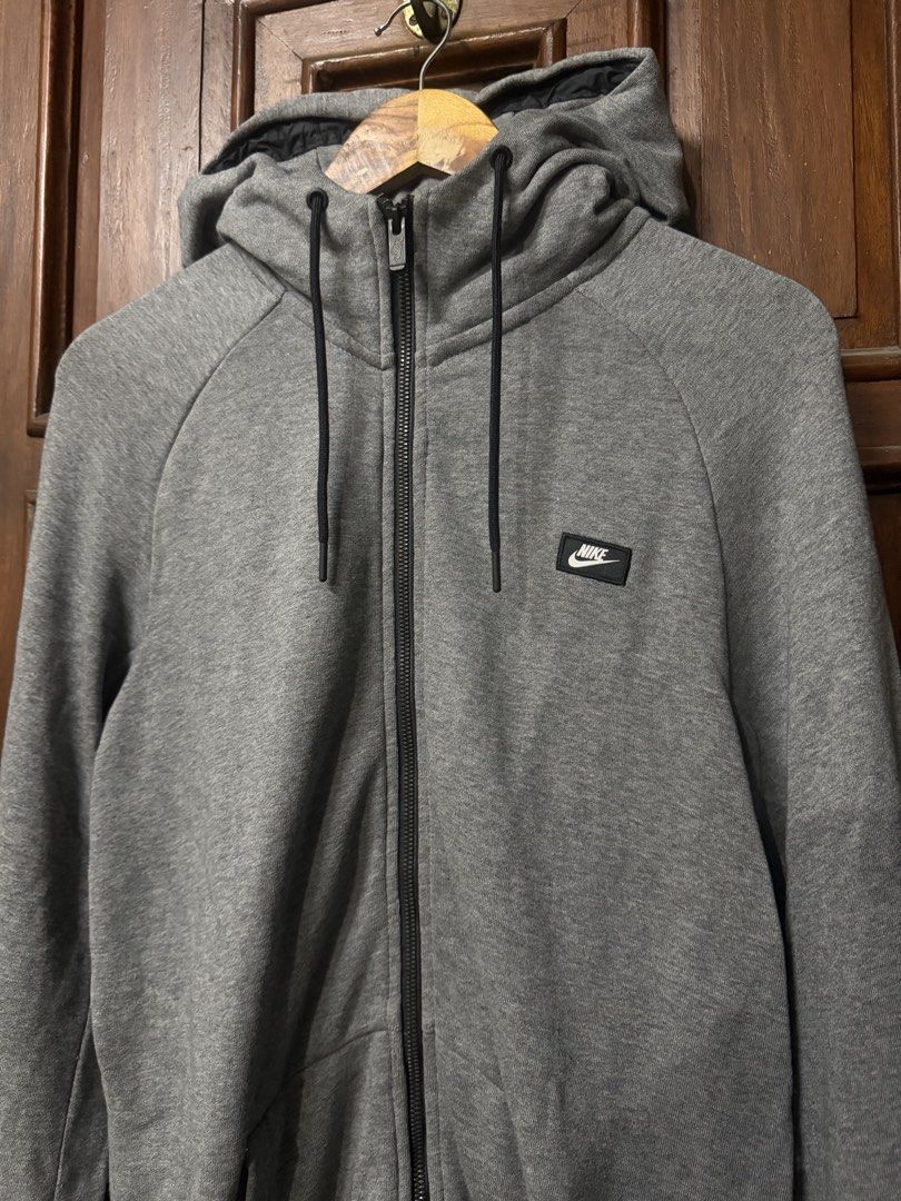 Nike Grey Full Zip Hoodie Jacket (Category: Coats, Jackets and Outerwear) located in Manila. Submitted by m.flojo (Listing ID 1462508761, Image 1). Description: - Grey Nike hoodie - Full zip closure - Nike logo on chest - Hood with drawstrings - Size: XL - Ideal for casual wear or sports.