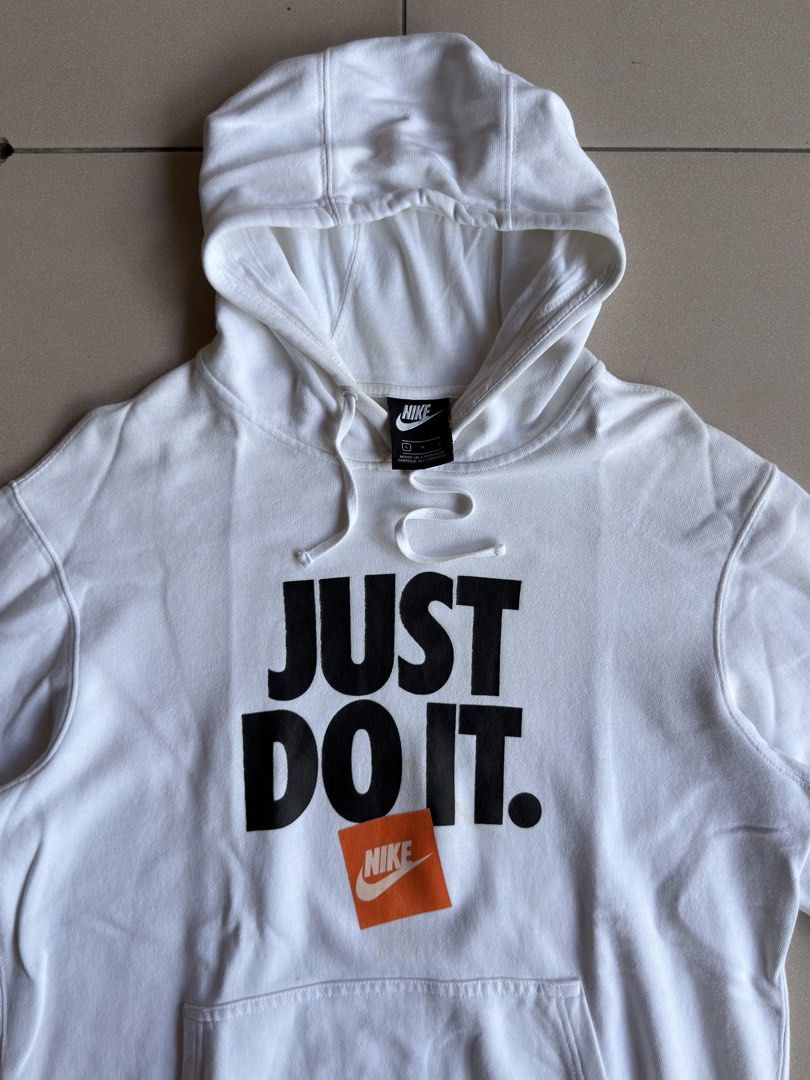Nike Just Do It White Hoodie (Category: Hoodies) located in Santa Rosa. Submitted by kelpikel (Listing ID 1462611219, Image 2). Description: AVAILABLE✅ NIEK - Size L on tag - W 21.5 - L 27 - Excellent Condition - Need Wash.
