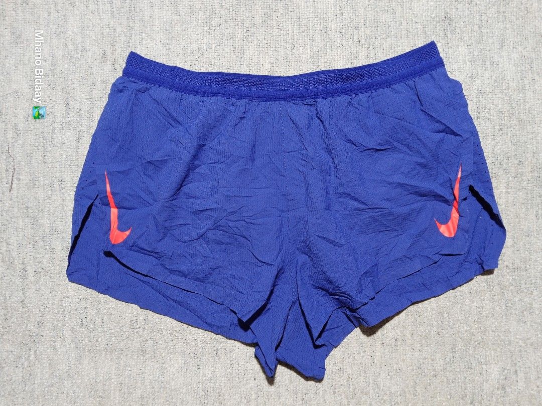 Nike Men's AeroSwift Split Running Shorts (Category: Activewear) located in Valencia. Submitted by mhano_bidaay_outdoors_218 (Listing ID 1462557915, Image 2). Description: - Nike Men's AeroSwift Split Shorts - Size: Small (fits waistline 28"-30") - Lightweight and quick-drying fabric - Excellent overall condition - Color rating: 9.9/10 - Measurements: Length 10", Leg Opening 13".