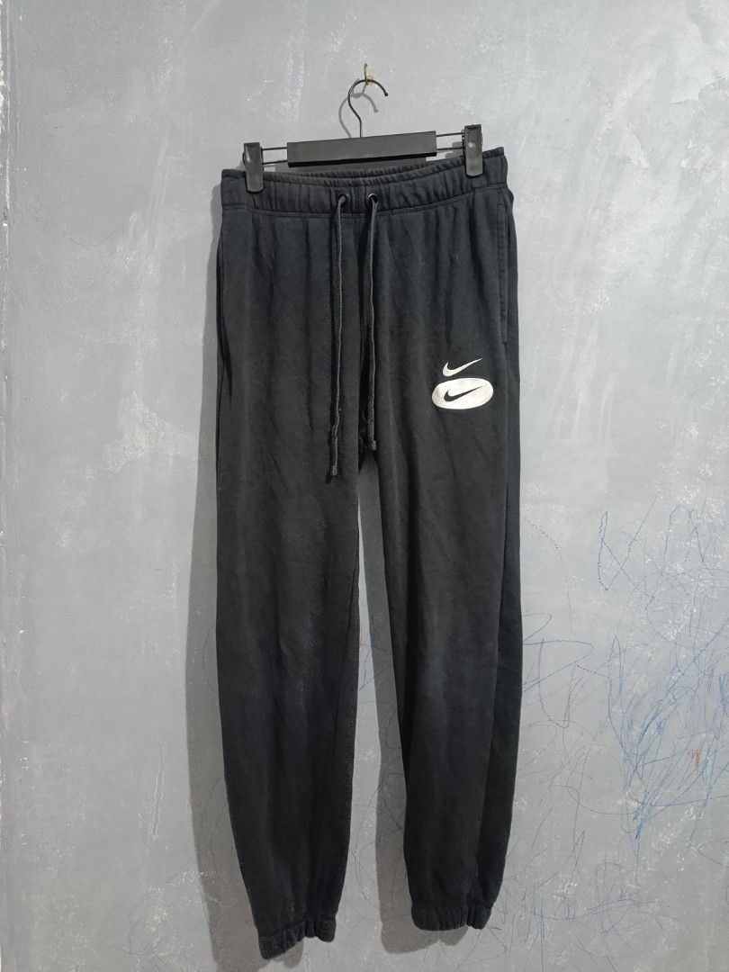 Nike Men's Embroidered Logo Training Joggers Black (Category: Joggers) located in Iloilo. Submitted by wendxcz-thrift- (Listing ID 1462619436, Image 2). Description: - Black Nike joggers for men - Size S - Embroidered double swoosh logo on left thigh - Elastic waistband with drawstring - Ribbed cuffs - Made in China MOP: GCASH/BPI + SF.