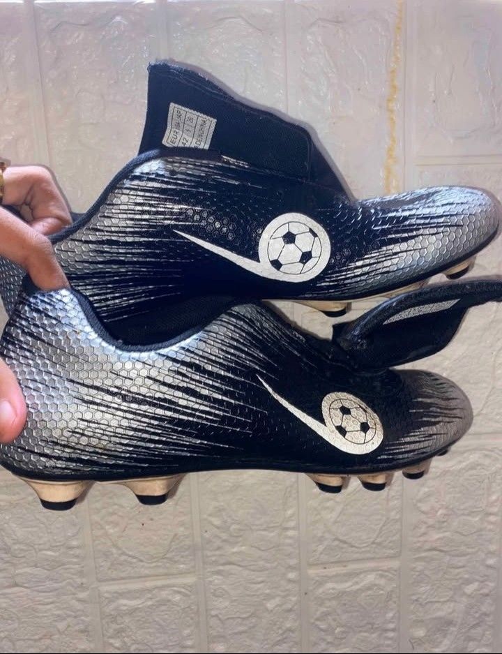 Nike Mercurial Soccer Cleats (Category: Racket and Ball Sports) located in Cebu City. Submitted by safemoon-64cb (Listing ID 1462672289, Image 2). Description: - Nike Mercurial soccer cleats - Color: Black and Silver - Size: 42 EUR - Unique textured upper - Sock-like fit for comfort and support - Ideal for playing on the field - Feel free to ask any questions!.