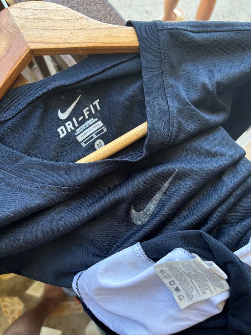 Nike midswoosh dryfit tee (Category: Activewear) located in Dinalupihan. Submitted by 2flip.cg (Listing ID 1462509533, Image 2). Description: Nike midswoosh dryfit tee Size medium on tag fit to large-xl Good condition issue: faded midswoosh logo width:23 length:28 ₱350.