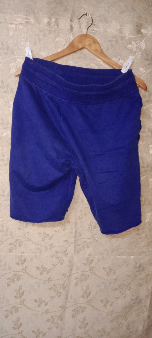 Nike Royal Blue Sweat Shorts (Category: Shorts) located in Manila. Submitted by ramelv3835712 (Listing ID 1462528157, Image 3). Description: - Royal blue Nike sweat shorts - Large white Nike logo on the side - Elastic waistband with drawstring - Side pockets - Waistline: 32-34 inches - Length: 20 inches - Ideal for lounging or casual wear.