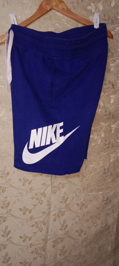 Nike Royal Blue Sweat Shorts (Category: Shorts) located in Manila. Submitted by ramelv3835712 (Listing ID 1462528157, Image 2). Description: - Royal blue Nike sweat shorts - Large white Nike logo on the side - Elastic waistband with drawstring - Side pockets - Waistline: 32-34 inches - Length: 20 inches - Ideal for lounging or casual wear.