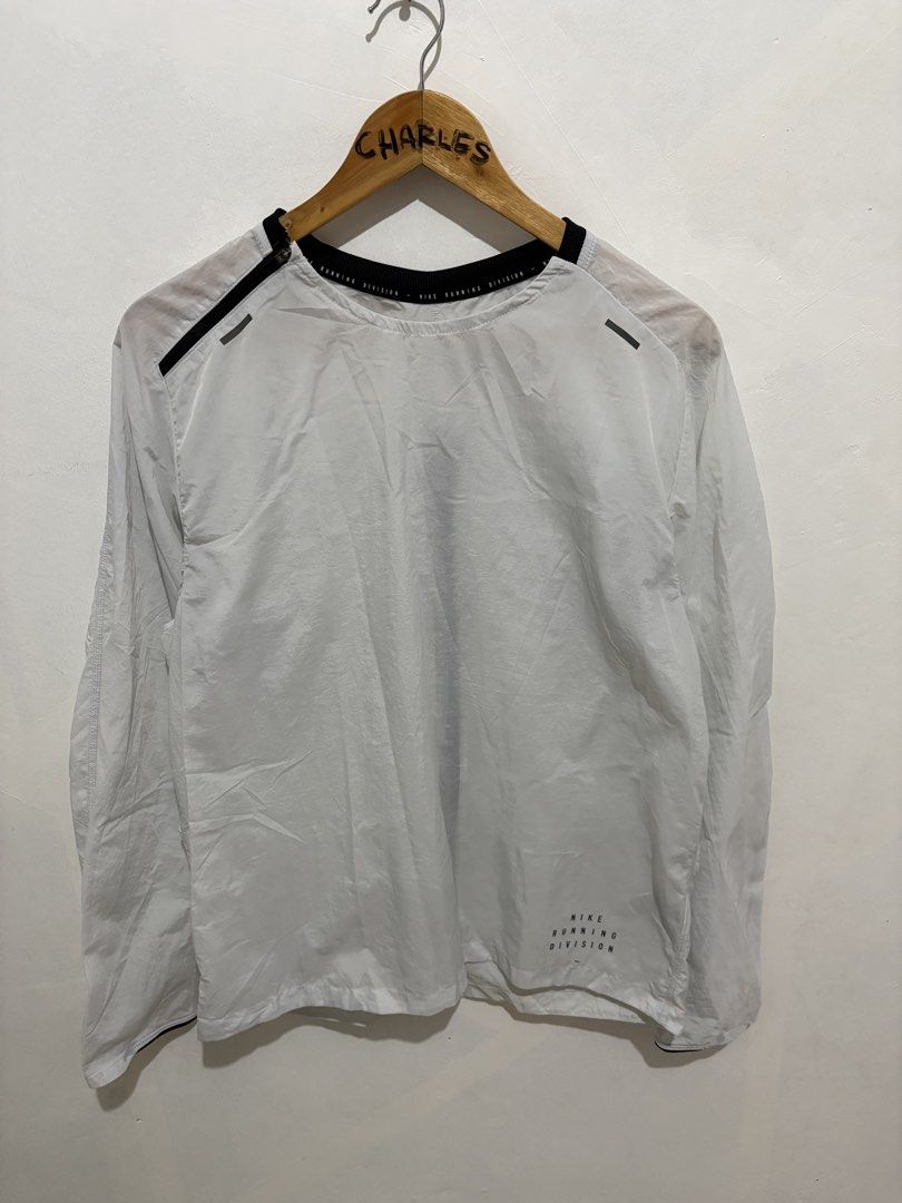 Nike Running Division Lightweight Jacket L (Category: Coats, Jackets and Outerwear) located in Cabanatuan. Submitted by chingweyyy (Listing ID 1462619331, Image 1). Description: - Nike Running Division Jacket - Lightweight material, ideal for running - Size: Large (L) - Made in Vietnam - Please check photos for detailed condition - 21 Width x 27 Length - No Issue.