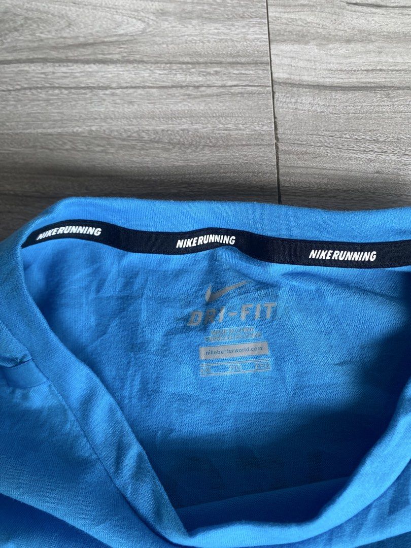 Nike Running dri-fit shirt (Category: Formal Shirts) located in Bacolod City. Submitted by bnta_bounce (Listing ID 1462470666, Image 2). Description: Flaws: cut wash tag Length 27/28 Width 21.