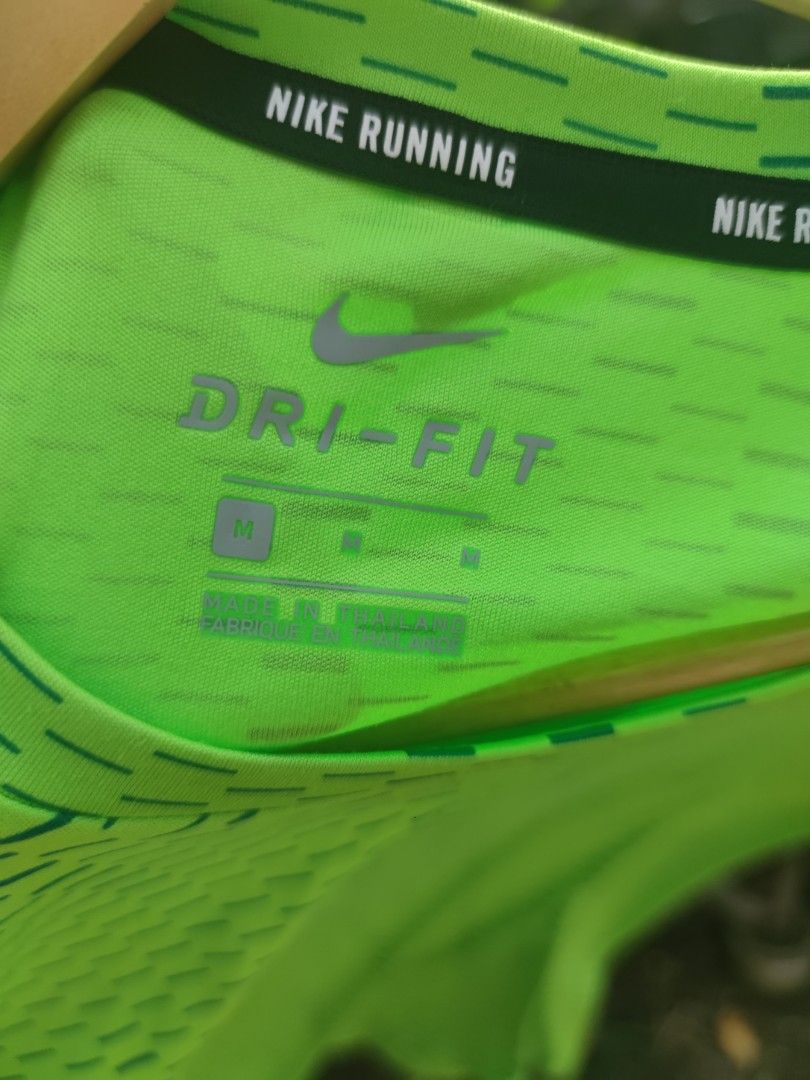 Nike Running Dri-FIT Shirt (Category: Activewear) located in Pasig City. Submitted by ftwind (Listing ID 1462677948, Image 3). Description: - Subtle all-over patterned design - Ideal for workouts or casual wear - Reflectorized check and markings - Authentic.