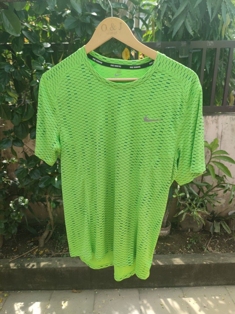 Nike Running Dri-FIT Shirt (Category: Activewear) located in Pasig City. Submitted by ftwind (Listing ID 1462677948, Image 1). Description: - Subtle all-over patterned design - Ideal for workouts or casual wear - Reflectorized check and markings - Authentic.