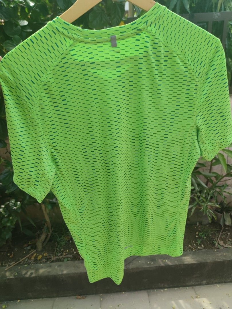 Nike Running Dri-FIT Shirt (Category: Activewear) located in Pasig City. Submitted by ftwind (Listing ID 1462677948, Image 2). Description: - Subtle all-over patterned design - Ideal for workouts or casual wear - Reflectorized check and markings - Authentic.