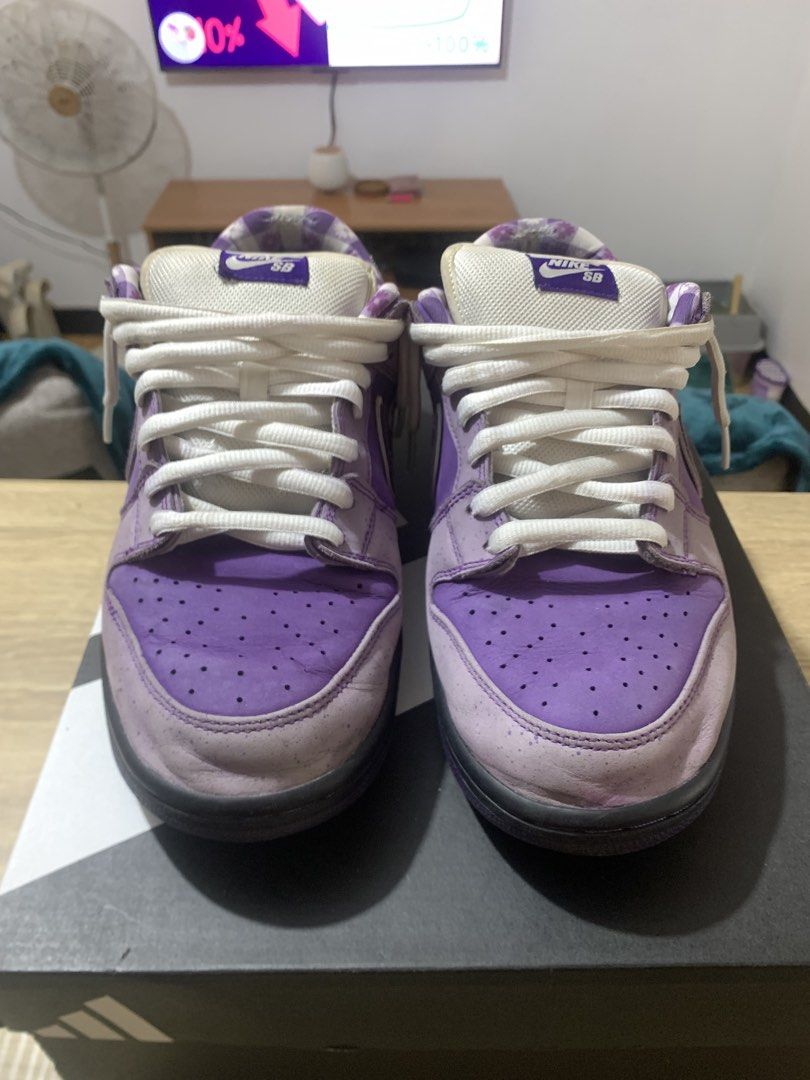 Nike SB Dunk Low “Purple Lobster” (Category: Sneakers) located in Mandaluyong City. Submitted by apolonio.draws-32895 (Listing ID 1462498318, Image 2). Description: - Nike SB Dunk Low Lobster (Purple) - Unique speckled pattern on the suede upper. - Features a stylish checkered design on the inner lining. - Comes with crisp white laces. - A must-have addition to any sneaker collection. .