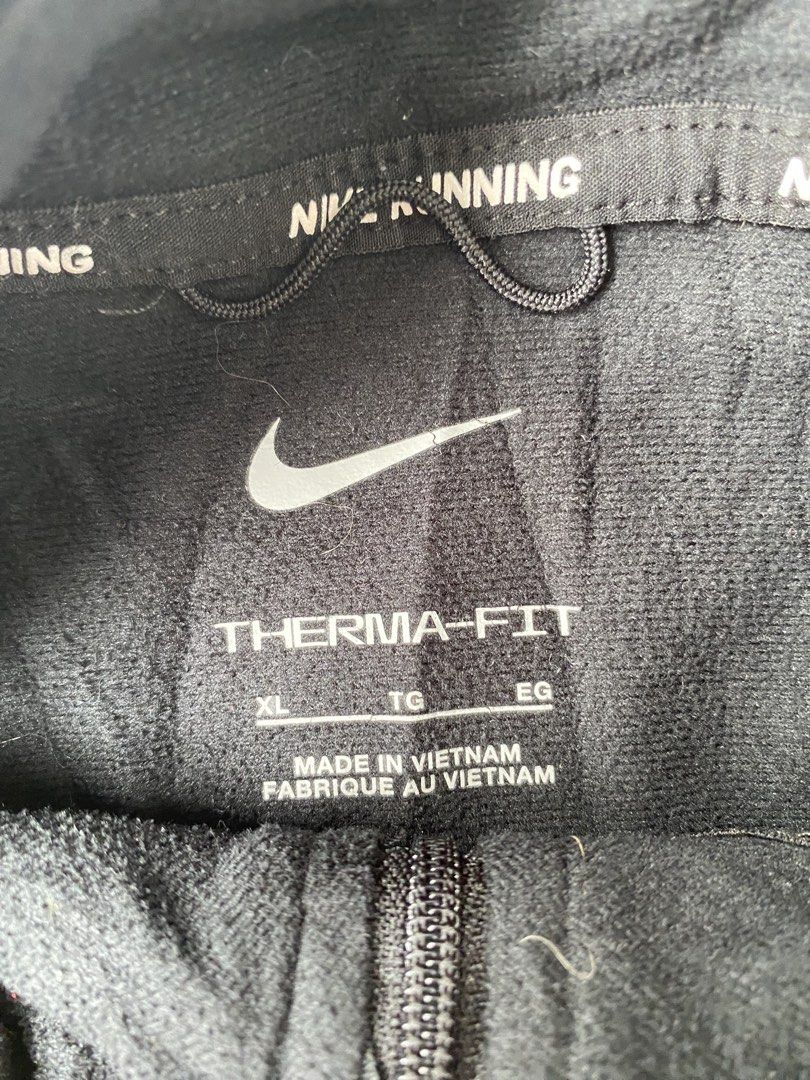 Nike Therma-Fit Running Jacket XL Black (Category: Coats, Jackets and Outerwear) located in Manila. Submitted by oddpenguin_cc96b9 (Listing ID 1462548701, Image 2). Description: - Nike Therma-Fit Running Jacket - Size: XL - Color: Black - Made in Vietnam - Lightweight and comfortable - Ideal for workouts or casual wear - Grab it now!.