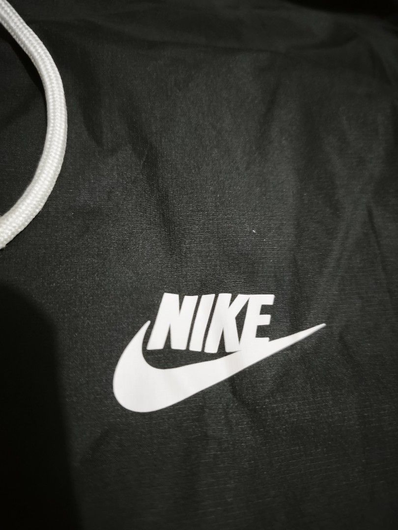 Nike Tri-tone Windbreaker (Category: Coats, Jackets and Outerwear) located in Taguig. Submitted by 3mthriftfinds2026 (Listing ID 1462619440, Image 3). Description: size XXL (best fit XL to semi XXL like new, laundry washed no issue 9.8/10 color rate .