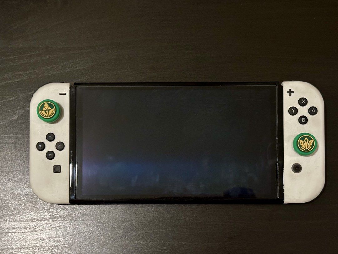 Nintendo Switch OLED - White (Category: Nintendo) located in Manila. Submitted by fuzzyeyebrows (Listing ID 1462450896, Image 3). Description: - Bought from the Nintendo Store last March 2026. Unit and accessories are in pristine condition - Price is negotiable. Feel free to inquire if interested - Bnew units go now for 22k - Barely used, good as new - Definitely no issues or defects - Covered with tempered glass - Comes with the default box incl