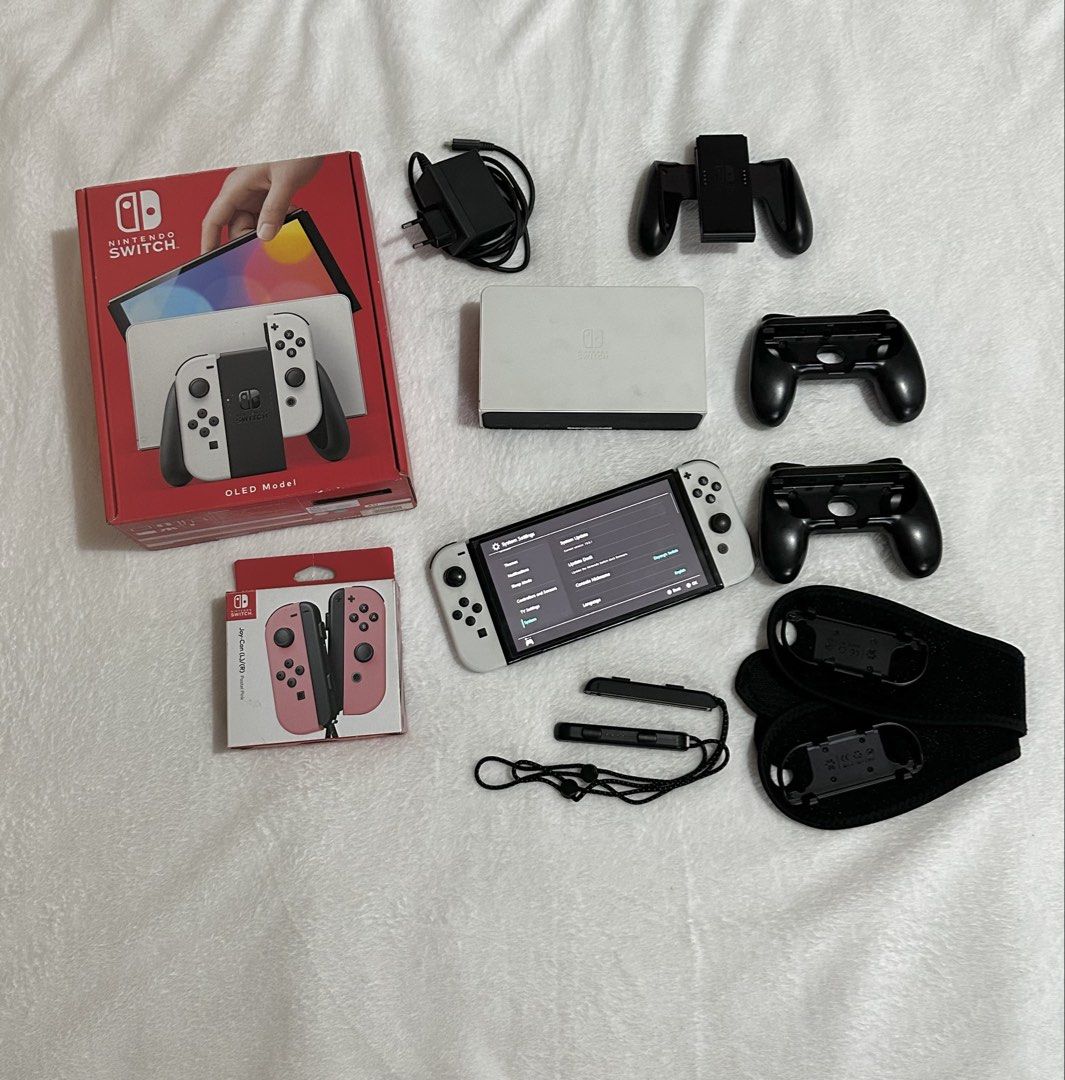 Nintendo Switch OLED Model (Category: Nintendo) located in Marikina City. Submitted by yana199x (Listing ID 1462538438, Image 2). Description: 🏷️ For Sale: Nintendo Switch Oled, Games and Accessories ⚠️ Please pakibasa ng caption, nag-effort ako magtype 😅 🎮 Nintendo Switch Oled (13K) ✨complete set w/ box ✨128 GB memory card included ✨ Free extra tempered glass ✨ Free sakura carrying case ✨ Free 2 wrist bands hand wrap kit ✨ Free 2 joycon handl