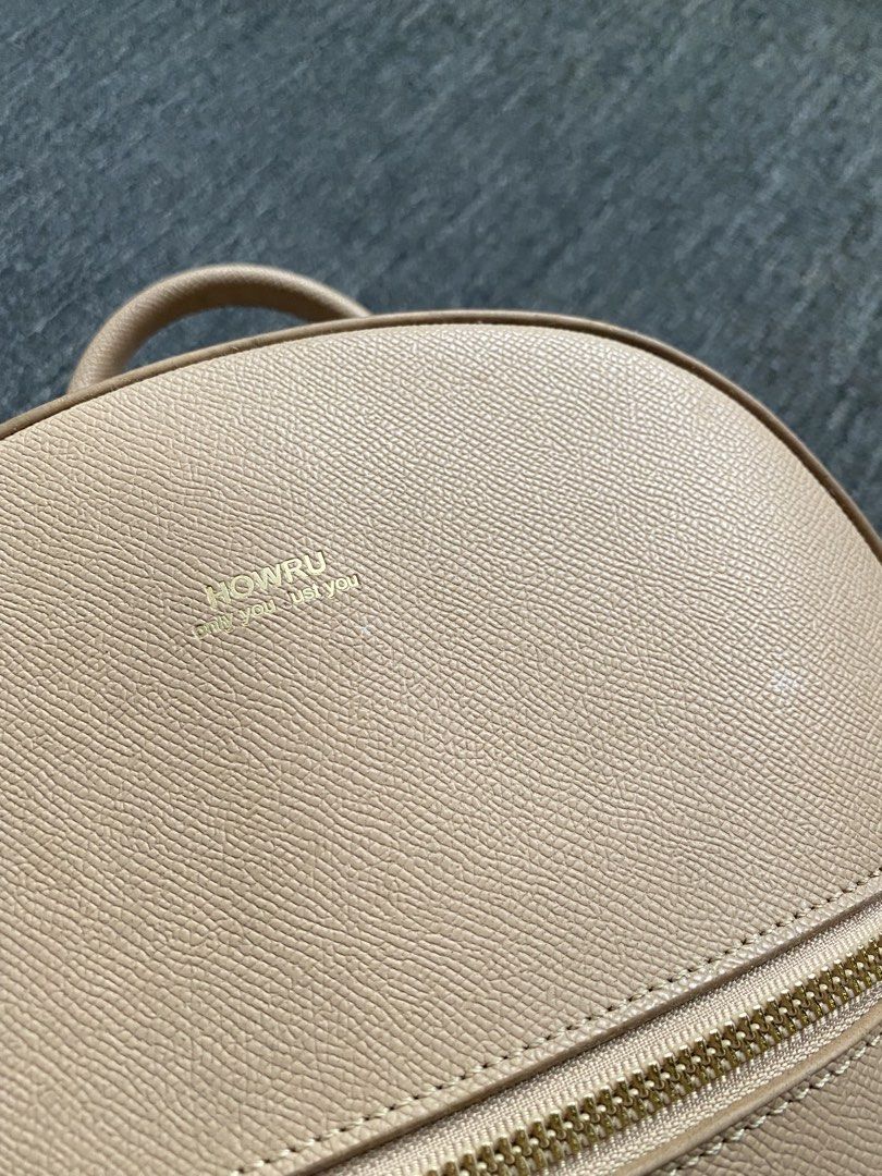 Nude Leather Mini Backpack (Category: Backpacks) located in Makati City. Submitted by clutterfree.life (Listing ID 1462515136, Image 2). Description: - Color: Nude - Size: 11” x 10” x 3” - Has internal pockets, one with zipper - Has zippered front pocket - Has slight discoloration on straps because of metal oxidation. Used once. .