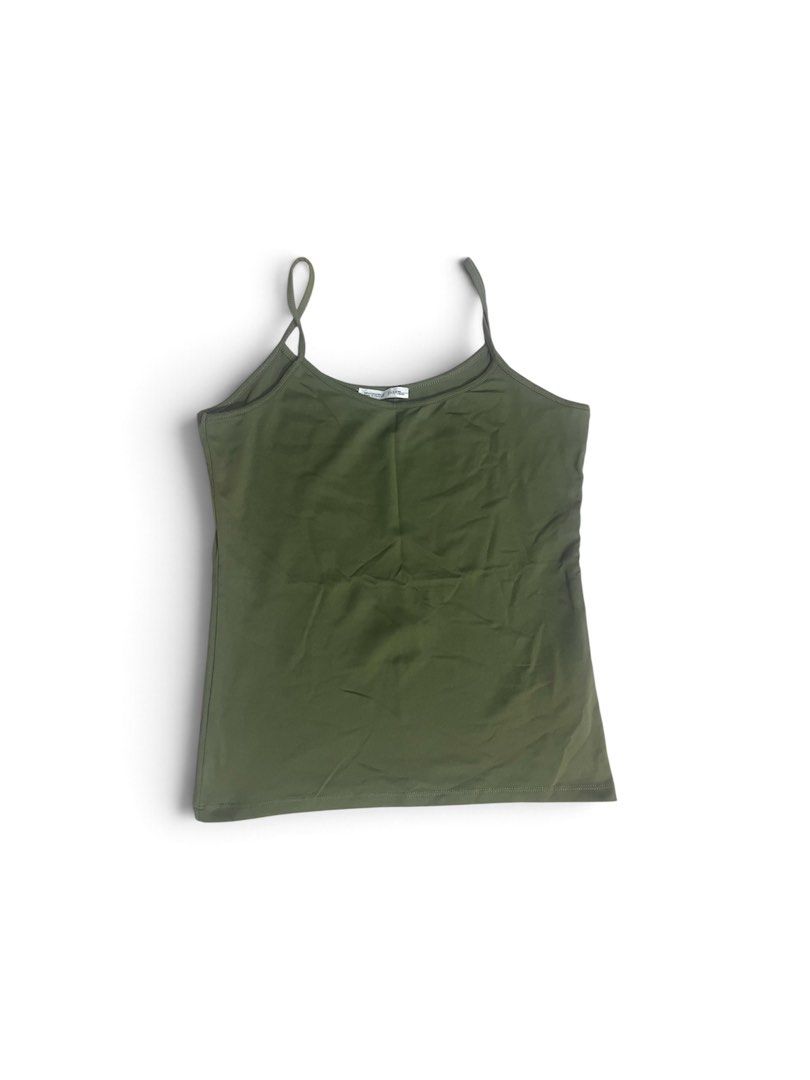 Olive Green Spaghetti Strap Camisole Top (Category: Sleeveless) located in Valenzuela. Submitted by _tann17 (Listing ID 1462511746, Image 1). Description: - Basic olive green camisole - Thin spaghetti straps - Soft and comfortable fabric - Versatile for layering or wearing on its own - Ideal for casual outfits or as an undershirt.