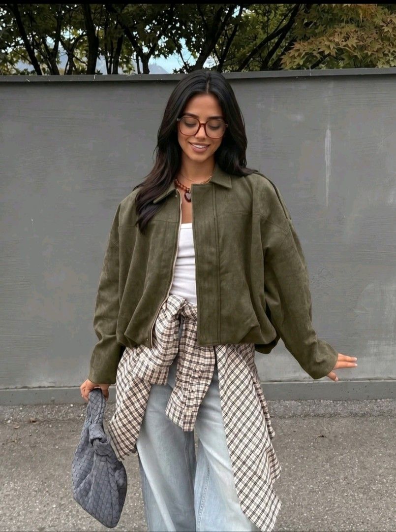 Olive Green Suede Bomber Jacket (Category: Coats, Jackets and Outerwear) located in San Juan City. Submitted by rwongthings (Listing ID 1462593925, Image 1). Description: - Oversized olive green bomber jacket - Suede-like material - Features a collar - Zipper and Button closure - Elasticated hem - Ideal for layering - Stylish and comfortable.