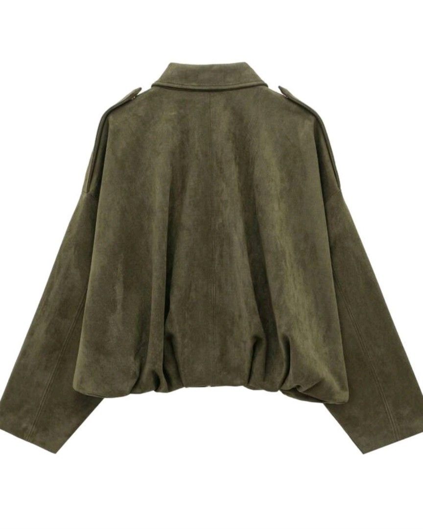 Olive Green Suede Bomber Jacket (Category: Coats, Jackets and Outerwear) located in San Juan City. Submitted by rwongthings (Listing ID 1462593925, Image 3). Description: - Oversized olive green bomber jacket - Suede-like material - Features a collar - Zipper and Button closure - Elasticated hem - Ideal for layering - Stylish and comfortable.