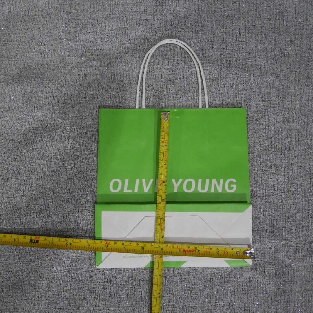 Olive Young small green/white Paper Bag – (Category: Other Stationery & Craft) located in Valenzuela. Submitted by cletini (Listing ID 1462635027, Image 3). Description: Condition Statement (Very Important): • Authentic: Guaranteed 100% original. • Swipe photos for paper bag size • The paper bag was used only once to transport the purchased item. • Condition : Please see photos for actual item and condition. • Transparency: I have inspected the b