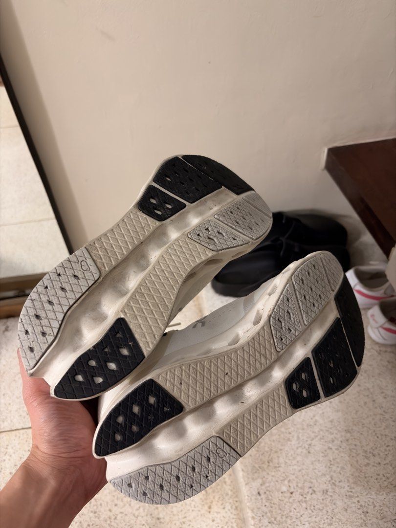 On Cloudsurfer 2 Running Shoes (Category: Sneakers) located in Quezon City. Submitted by rofervic (Listing ID 1462619456, Image 2). Description: - On Cloudsurfer 2 Running Shoes - Color: White - Size: US Men's 9.5 - Original box included - Condition: Minor scuffs on soles and uppers from normal wear, still has plenty of life left - Ideal for: Everyday runs and casual wear.