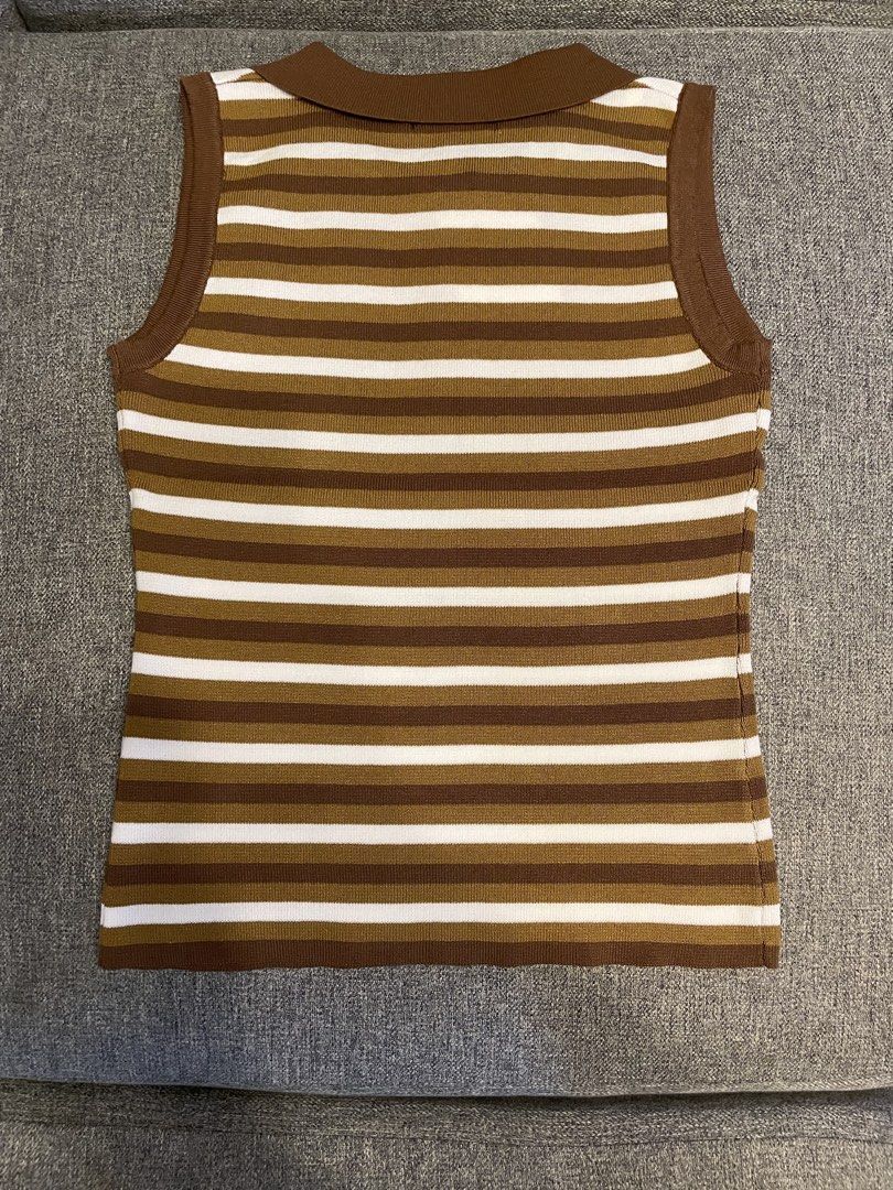 One K BKK Stripes Sleeveless Top (Category: Blouses) located in Quezon City. Submitted by mfordma (Listing ID 1462594290, Image 2). Description: BRAND NEW Originally bought for 599.00 Doing a little closet decluttering! ✨ Letting go of some pieces that are still in great condition and looking for a new home. 🤍 Brand: ONE-K Size: Free size Color: Brown/Cream/Tan Description: - Slightly stretchable ribbed knit sleeveless design - Brown, white, and