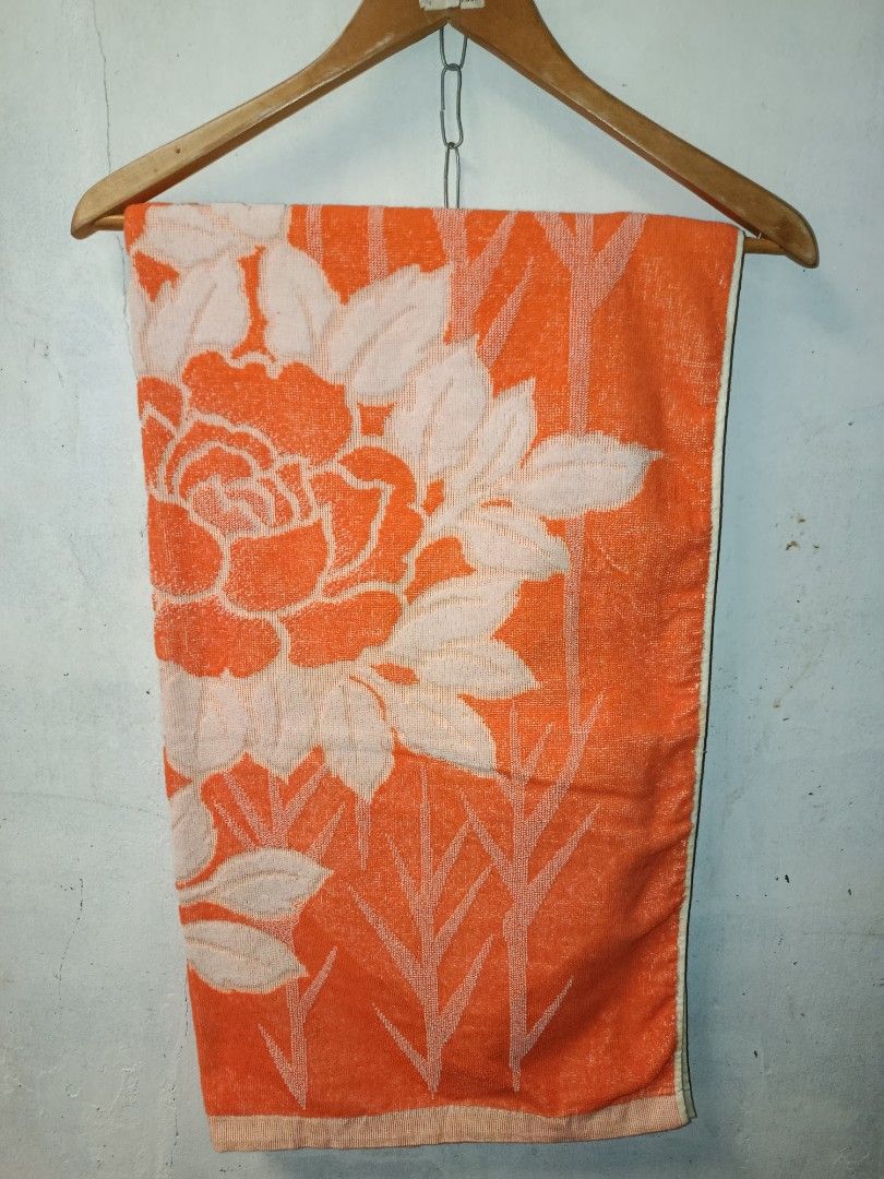 Orange Floral Bamboo Towel (Category: Bedding & Towels) located in Nabunturan. Submitted by marmitoren42236 (Listing ID 1462671011, Image 1). Description: - Vibrant orange towel with a beautiful floral and bamboo print. - Luxuriously soft and highly absorbent. - Generous size: approximately 28 inches by 54 inches. - Ideal for both bathroom use and beach trips. - A great everyday towel, ready for its new owner..