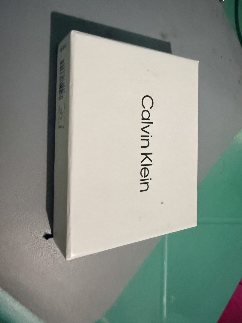 Original / Authentic Calvin Klein slim trifold wallet (Category: Wallets & Card Holders) located in Marilao. Submitted by chloedianela (Listing ID 1462587271, Image 1). Description: Original / Authenthic Calvin Klein Trifold Wallet Genuine Leather Good as New RFID No issue comes with Box RFS: Decluttering Selling for PHP 1500.