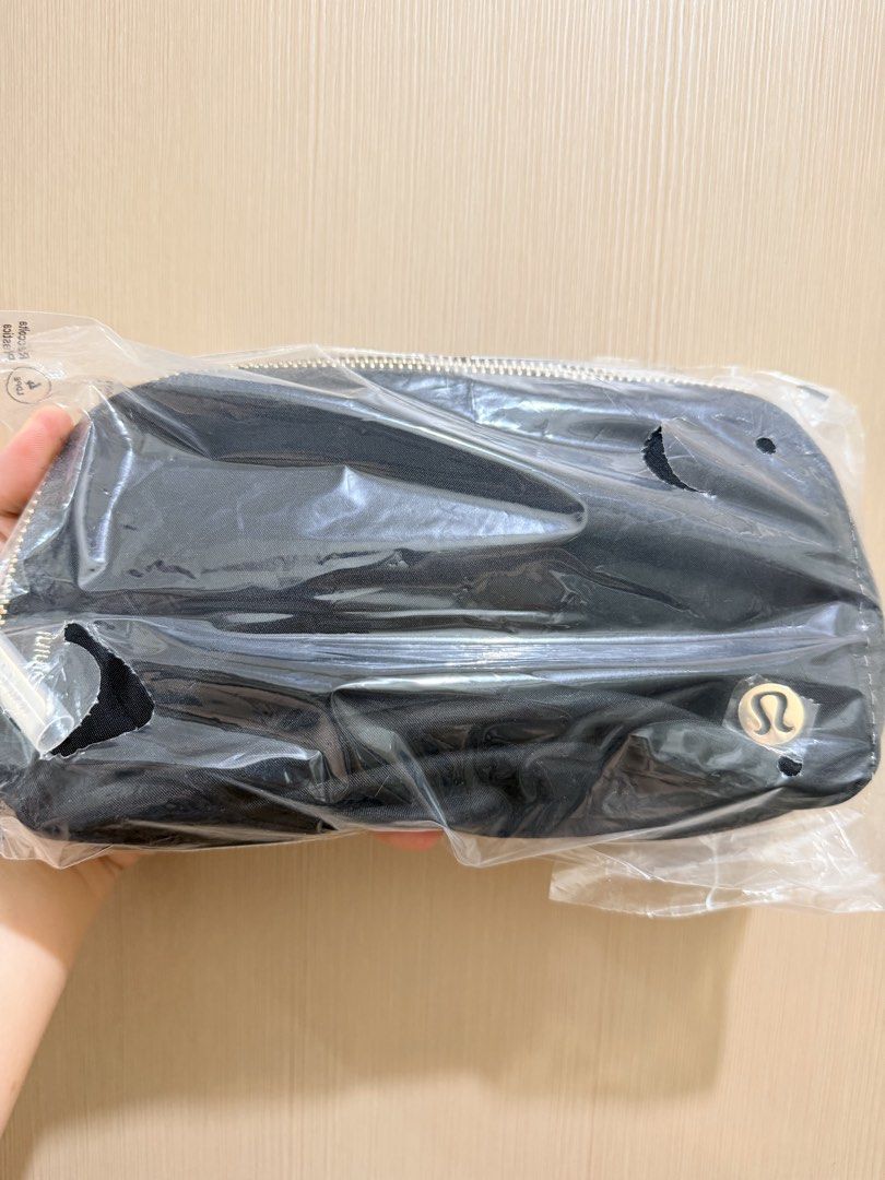 Original Lululemon Everywhere Belt Bag Pouch (Category: Purses & Pouches) located in Manila. Submitted by tawni (Listing ID 1462588852, Image 3). Description: - Lululemon Everywhere Belt Bag Pouches - Available Colors: Blue, Pink, Black, Cream - All items are in original packaging - Ideal for organizing your daily essentials - Perfect size for everyday use ₱2,100 - 1 liter (black & cream) ₱2,500 - 2 liters (blue & pink).