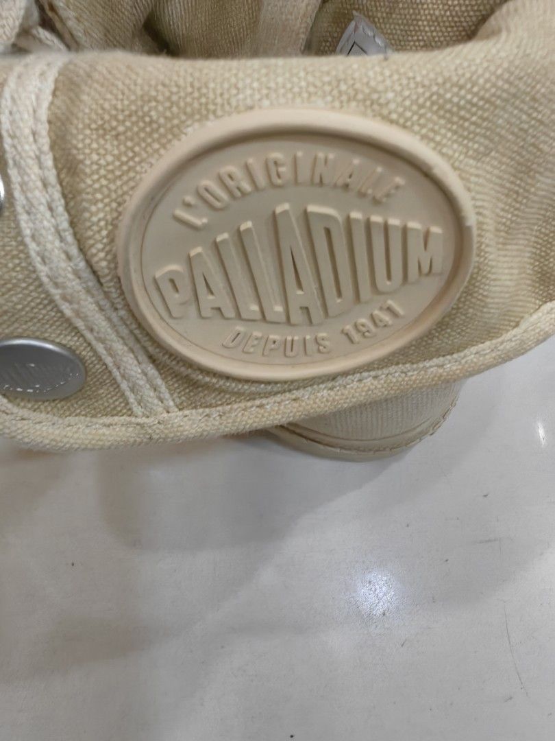 Palladium Beige Canvas Lace-Up Boots (Category: Boots) located in Quezon City. Submitted by flat.earther23 (Listing ID 1462455990, Image 3). Description: - Palladium high-top boots - Neutral beige canvas - Lace-up closure - Foldable collar - Made in Indonesia - Size: 38 EU / 7 US.