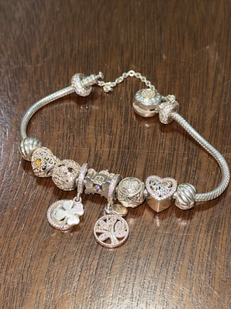 Pandora pre-loved Charms (Category: Luxury Accessories) located in Paranaque City. Submitted by ica.hbrn (Listing ID 1462641856, Image 1). Description: ✨ PANDORA PRELOVED CHARMS & BRACELET FOR SALE 15k for all!!! (11pcs) All items are preloved and in good condition. 1.Pandora Love Script Two-Tone Heart Charm • Sterling silver with 14K yellow gold heart accent • SKU: 792037CZ • Preloved price: ₱2,275 2.Pandora Sparkling Pavé Safety Chain Charm • S